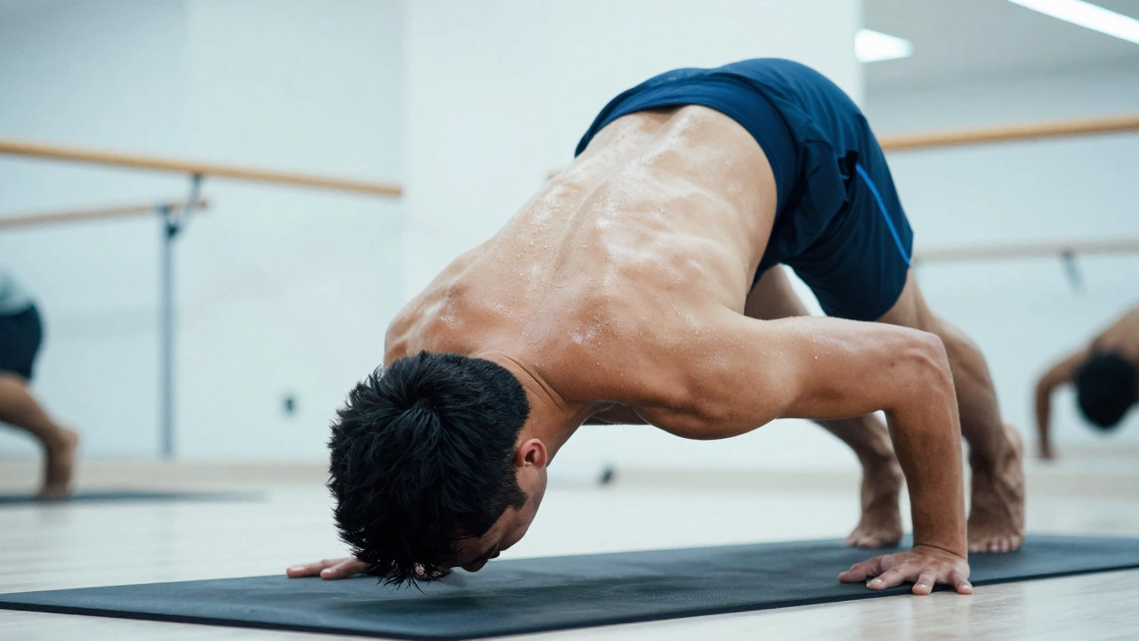 Athlete sweating during intense yoga flow pose